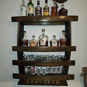 Handcrafted Whiskey Barrel Wall Bar: Rustic Reclaimed Stave Liquor Shelf for Man Cave Decor