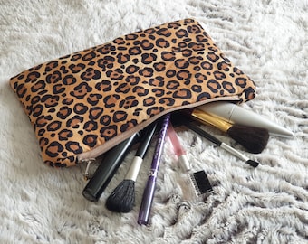 Leopard print, make-up bag, pouch, cosmetic bag.