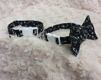 Cat collar,breakaway safety buckle,collar with bell,matching bow tie,fabric music on black.