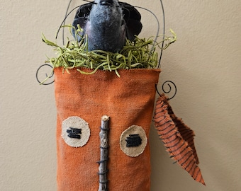 Fang, our prim wool felt halloween witch mouse in a pumpkin bag