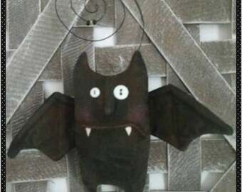 Ozzy, our favorite Halloween primitive bat hanger