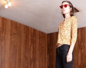 90s does 60s floral blouse