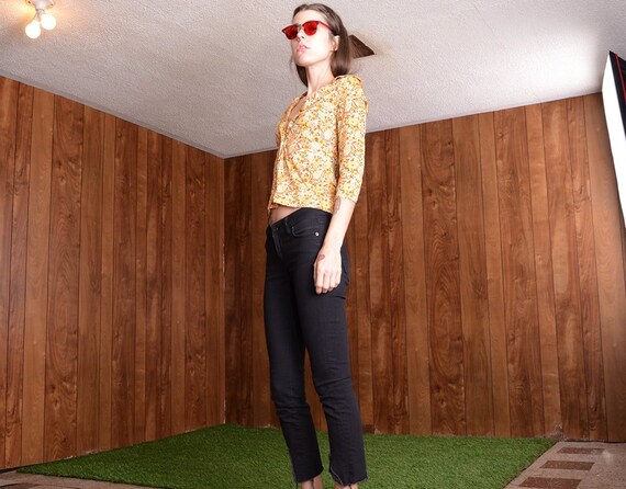 90s does 60s floral blouse