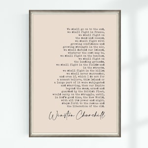 May include: Framed print featuring a quote by Winston Churchill in a vintage typewriter font. The text is arranged in a unique, cascading layout on a beige background, with the author's signature at the bottom. The frame is a neutral, light brown.