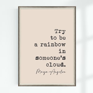 Op de afbeelding: Een beige printbare quote poster met zwarte tekst die luidt: "Probeer een regenboog te zijn in iemands wolk." De quote wordt toegeschreven aan Maya Angelou.