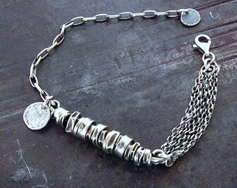 Oxidized sterling silver multi-chain bracelet with brushed silver beads