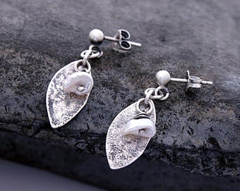 White keshi pearl oxidized silver stud earrings – raw textured leaf drop