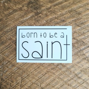 born to be a saint vinyl stickers. New design. Religious sticker. Catholic vinyl sticker. Catholic water bottle sticker.  FREE SHIPPING.