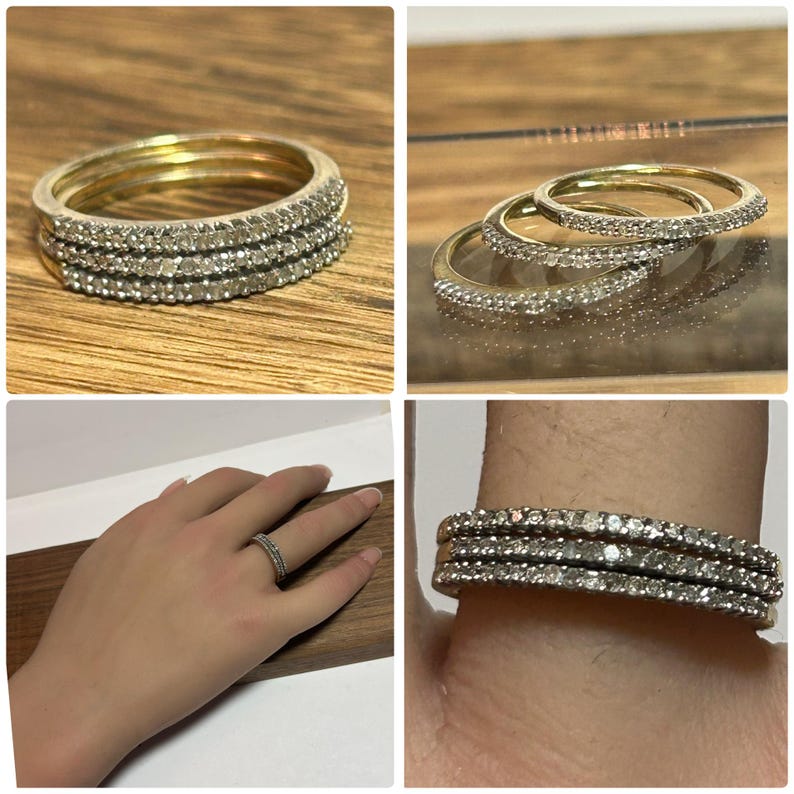 May include: Stackable gold rings with clear gemstones. The rings are shown in multiple views, including a close-up of the rings stacked together, and a single ring on a finger. The rings are on a wooden surface.