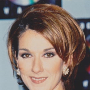Celine Dion Tiny Pearl Earrings 4x6 photo