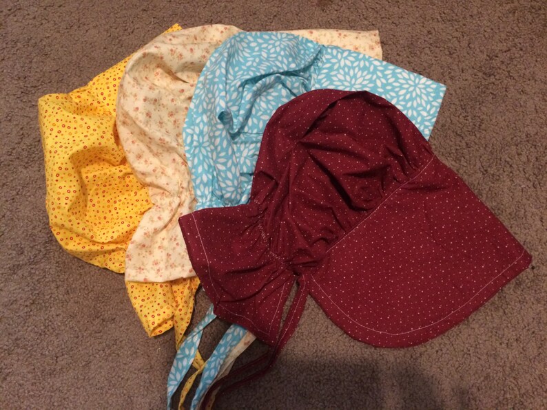 Calico pioneer bonnets.