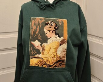 Tannengrüner, individuell gestalteter Canvas-Hoodie „Der Leser“ (M)