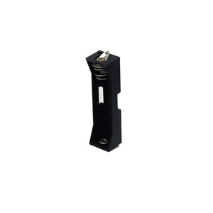 May include: Black plastic battery holder with a spring and a metal contact point.