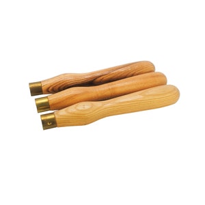 May include: Three wooden tool handles with brass ferrules. The handles are made of light brown wood with a natural grain pattern.