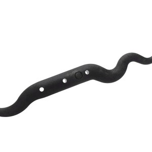 May include: Black metal hook with a curved shape and three holes.