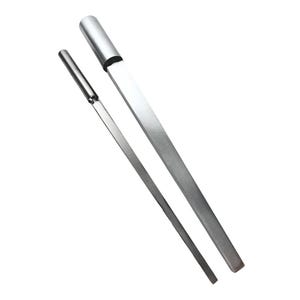 May include: Two silver metal tools, one with a rounded end and the other with a pointed end.