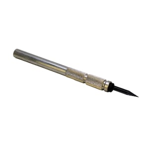 May include: A silver and black tool with a pointed tip. The tool has a textured grip and a black tip.