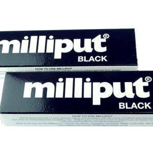May include: Two tubes of black Milliput epoxy putty. The tubes are labeled "milliput" and "BLACK". The text "HOW TO USE MILLIPUT" is printed on the bottom of each tube.
