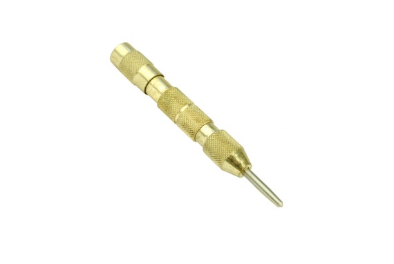 Spring loaded brass center punch