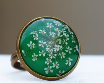 Ring with real flower