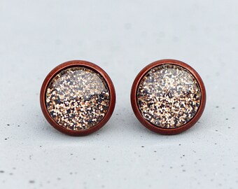 Studs - Copper-coloured stud earrings with golden dots