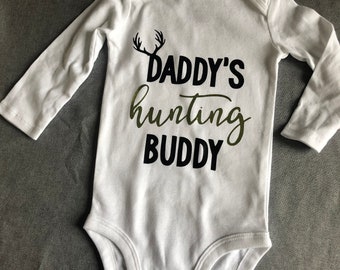 thumbnail image 2 of Cute & Funny Daddy's New Hunting Buddy Baby Bodysuit - Eco-Friendly Printed One-Piece Outfit 2 of 10