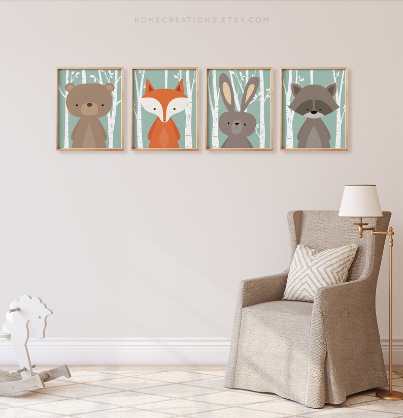 Woodland nursery wall decor set of 4 rustic forest prints displayed in baby boy room