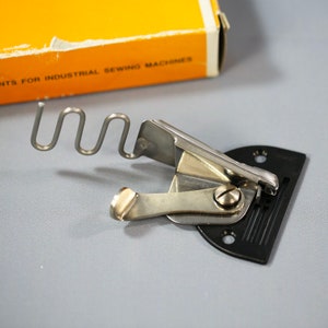 Coverstitsh Binder attachment for industrial sewing machine, Machine Binder