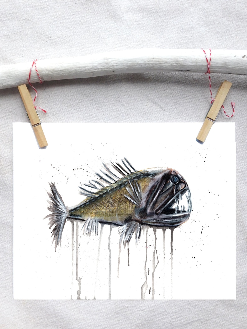May include: A watercolor painting of a black and brown deep sea fish with sharp teeth and a long, thin body. The fish is depicted with a white background and water dripping from its body.