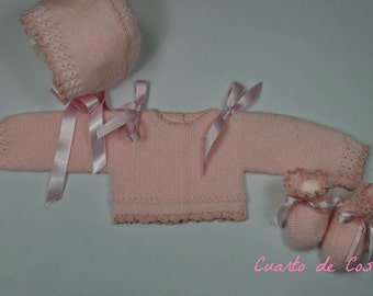 Pattern for 3-piece outfit (sweater, hat, booties) with braided holes and flounce