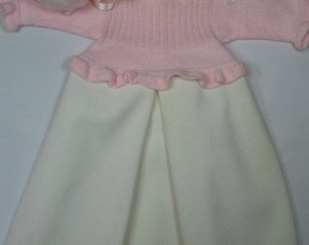 Pattern for 3-piece set (sweater, hat and booties) with elastic yoke and garter stitch ruffle.