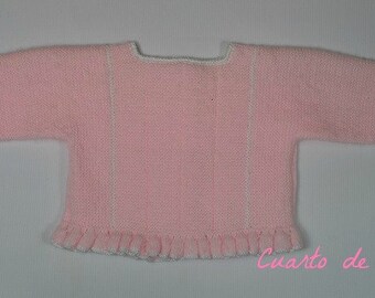 Pattern for a sweater with a ruffle for a baby from 1 to 3 months of age.