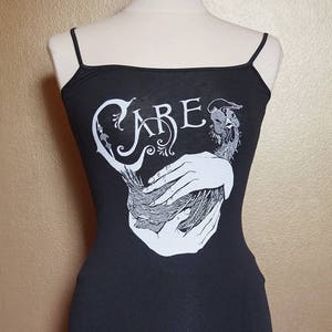 Small &quot;Care&quot; Tank, White Ink on Black