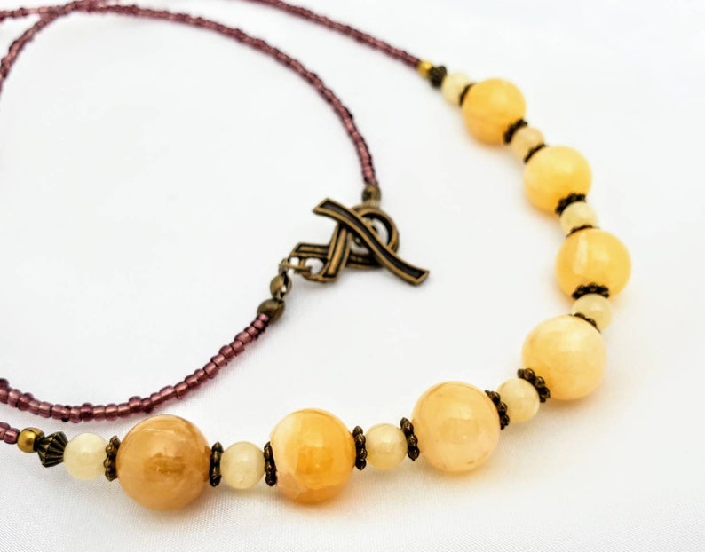 Long boho golden alabaster calcite necklace. Luminous Etsy