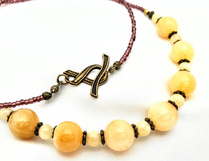 Long boho golden alabaster calcite necklace. Luminous Etsy