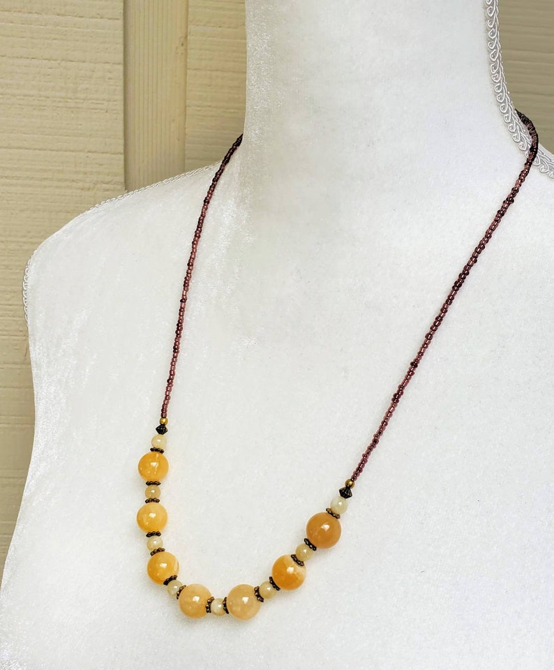 Long boho golden alabaster calcite necklace. Luminous Etsy