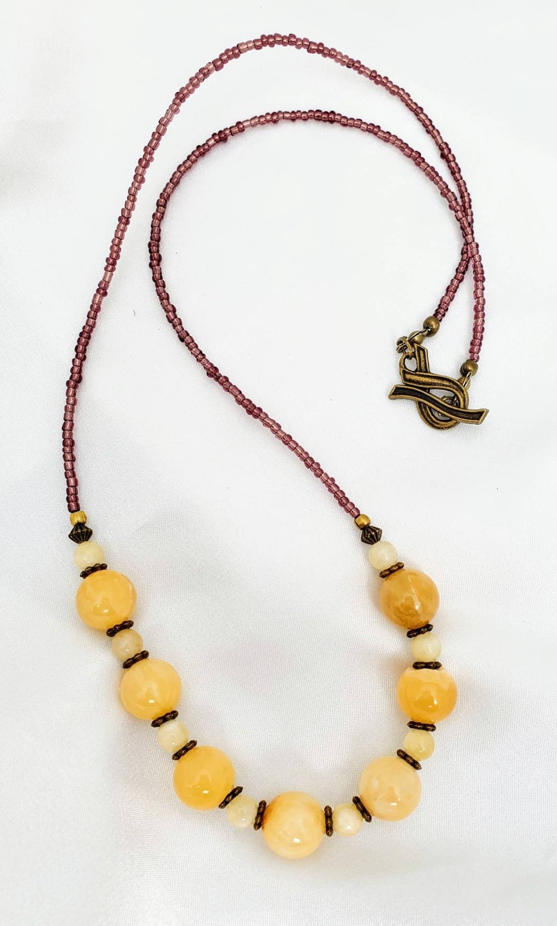 Long boho golden alabaster calcite necklace. Luminous Etsy