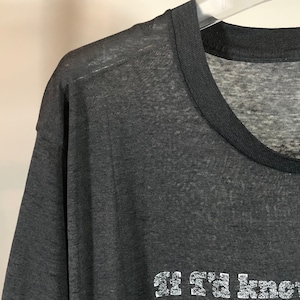 May include: Dark gray t-shirt with a black collar. The shirt has the text "If I'd known" printed in a distressed white font. The fabric appears thin and slightly see-through, with a vintage or retro style.