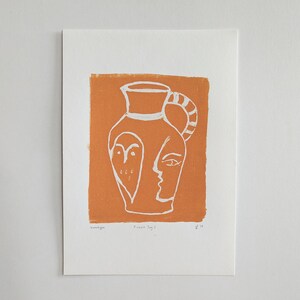 May include: A white line drawing of a pitcher with an owl and a face on it. The pitcher is on a burnt orange background. The text "Picasso Jug 3" is at the bottom of the image.