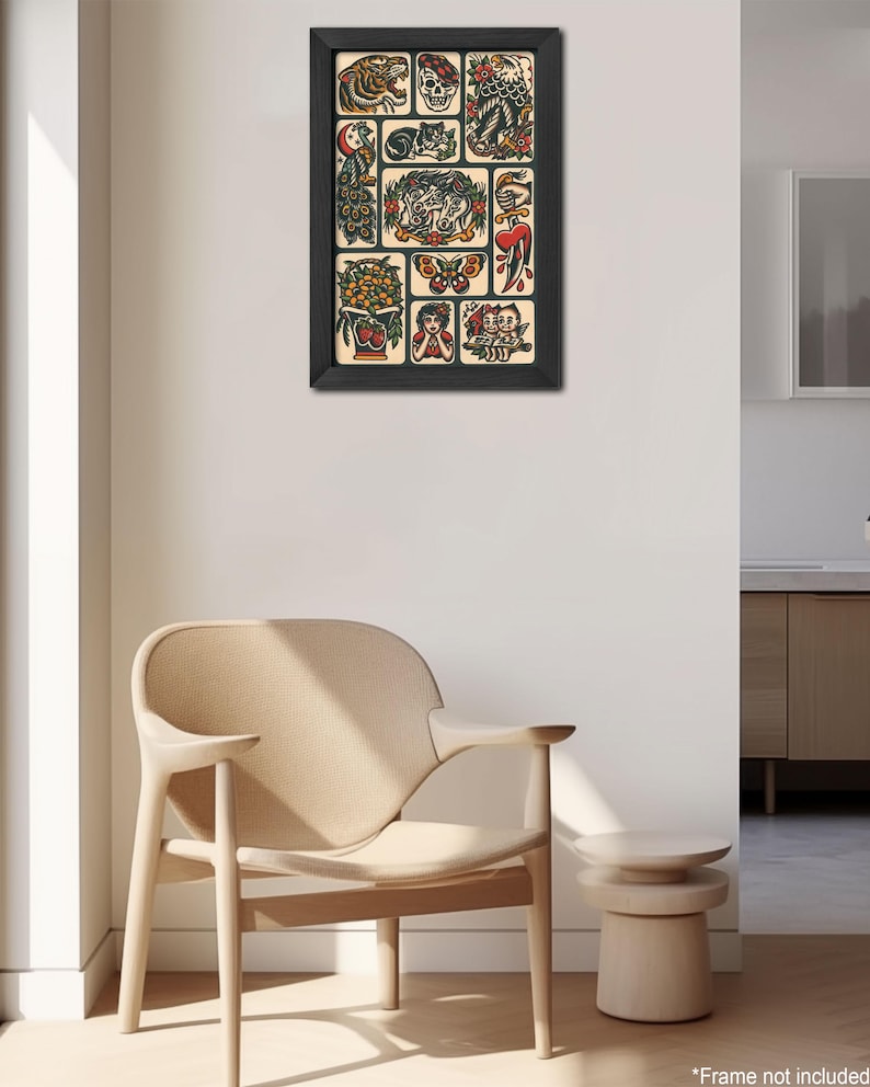 May include: A framed print of a traditional tattoo flash sheet with various designs, including a tiger, skull, eagle, peacock, butterfly, heart, flowers, and a woman with a flower in her hair.