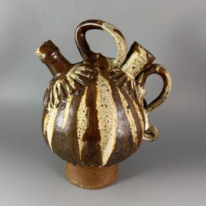 Whimsical Pottery Art Jug with Two Spouts
