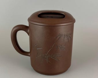 Taza de té china con tapa, hecha de arcilla púrpura de Yixing Zisha.
