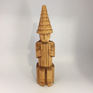 Primitive Wood Sculpture - Hand Carved Man Playing the Flute - South America Folk Art - Height is 13”