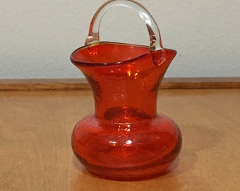 Red Crackle Glass Pitcher with Clear Handle - Height is 4 1/2”