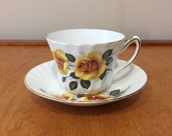 Delphine English Bone China Teacup and Saucer: Yellow Roses