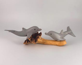 Two Grey Dolphins Mounted on Parasite Wood
