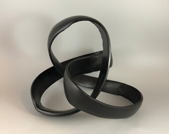 Black Metal Infinite Statue