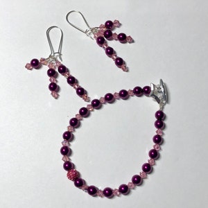 Preciosa deep magenta pearl bracelet set with Swarovski crystals, rose Pave ball and toggle with matching earrings.