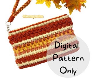 Könnte beinhalten: Eine gehäkelte Clutch-Tasche mit einem geflochtenen Riemen in Orange-, Gelb- und Weißtönen. Die Tasche hat ein gewebtes Muster und ist mit "Digitales Muster nur" beschriftet.
