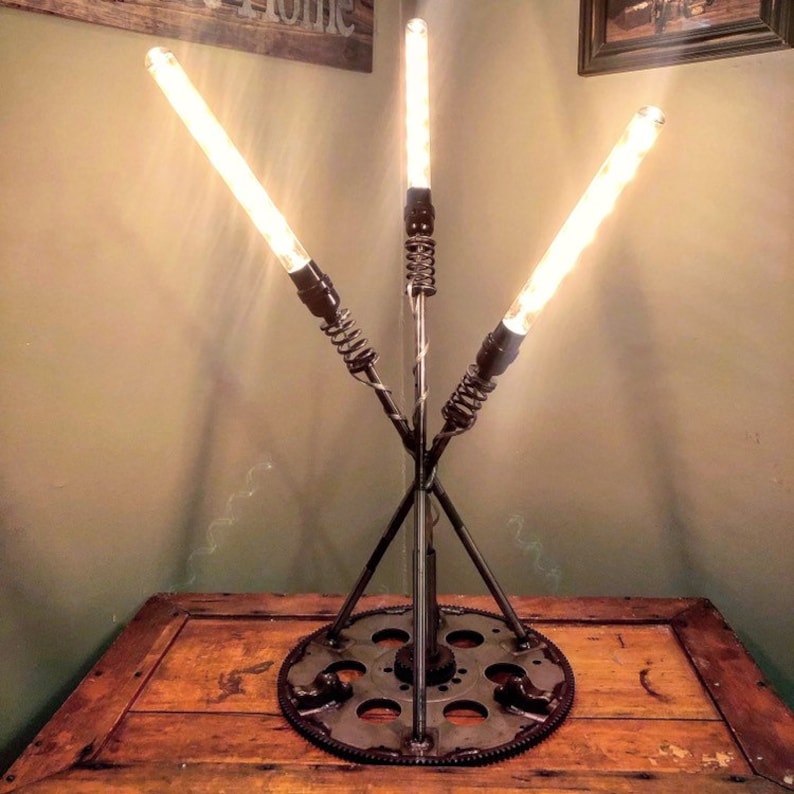 Handmade hot rod inspired tabledesk lamp made from various engine and transmission parts.